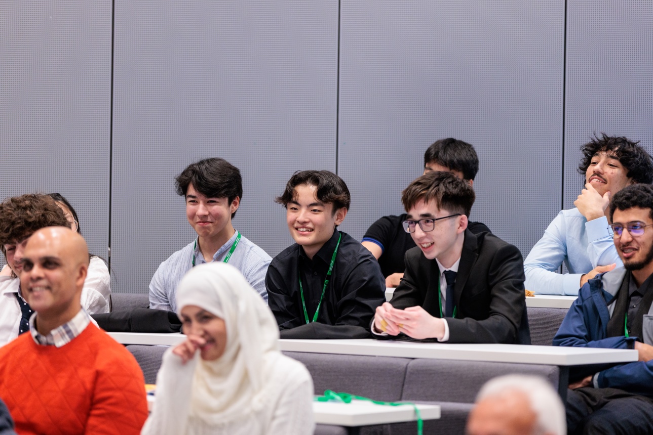 Students watching their peers present