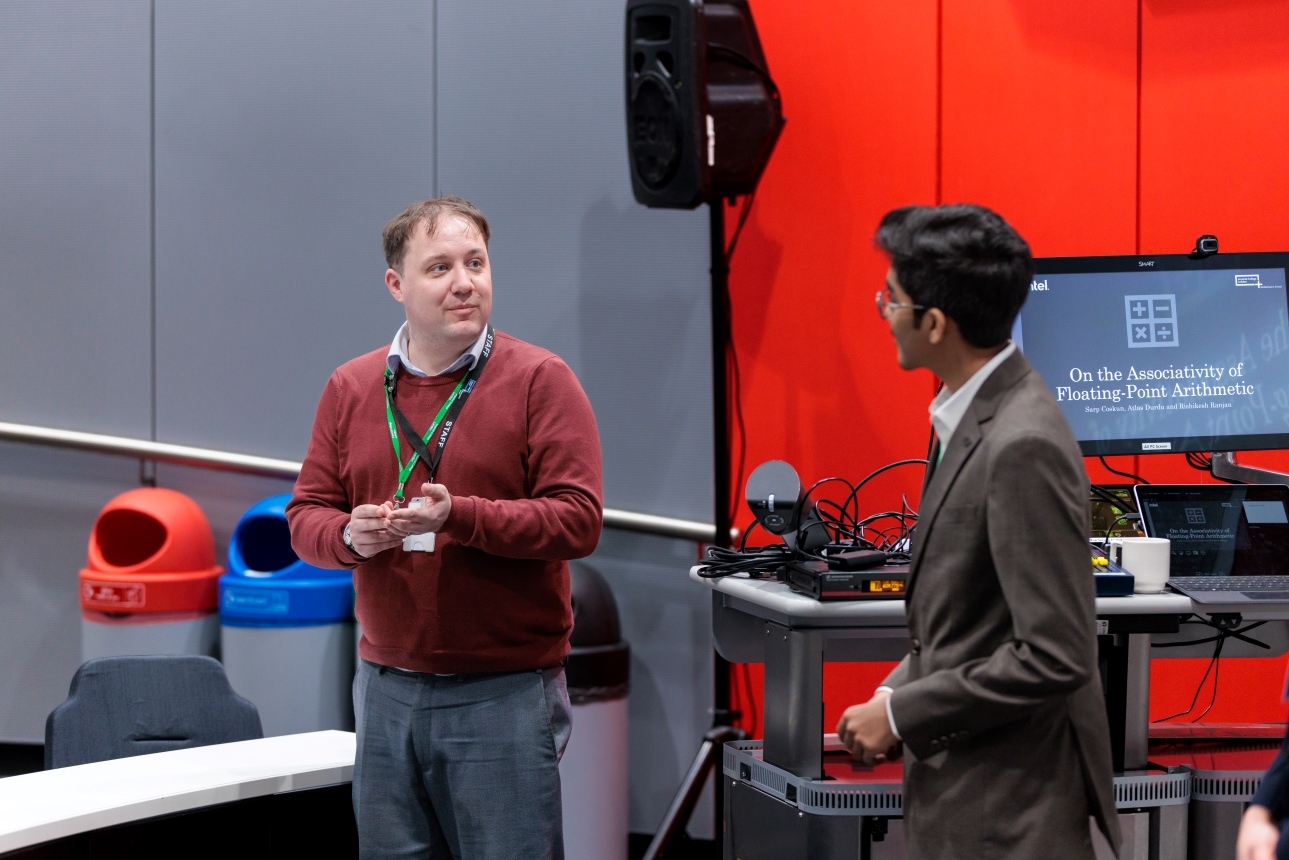 Deputy Headteacher Tim Grundy discusses a project with a student