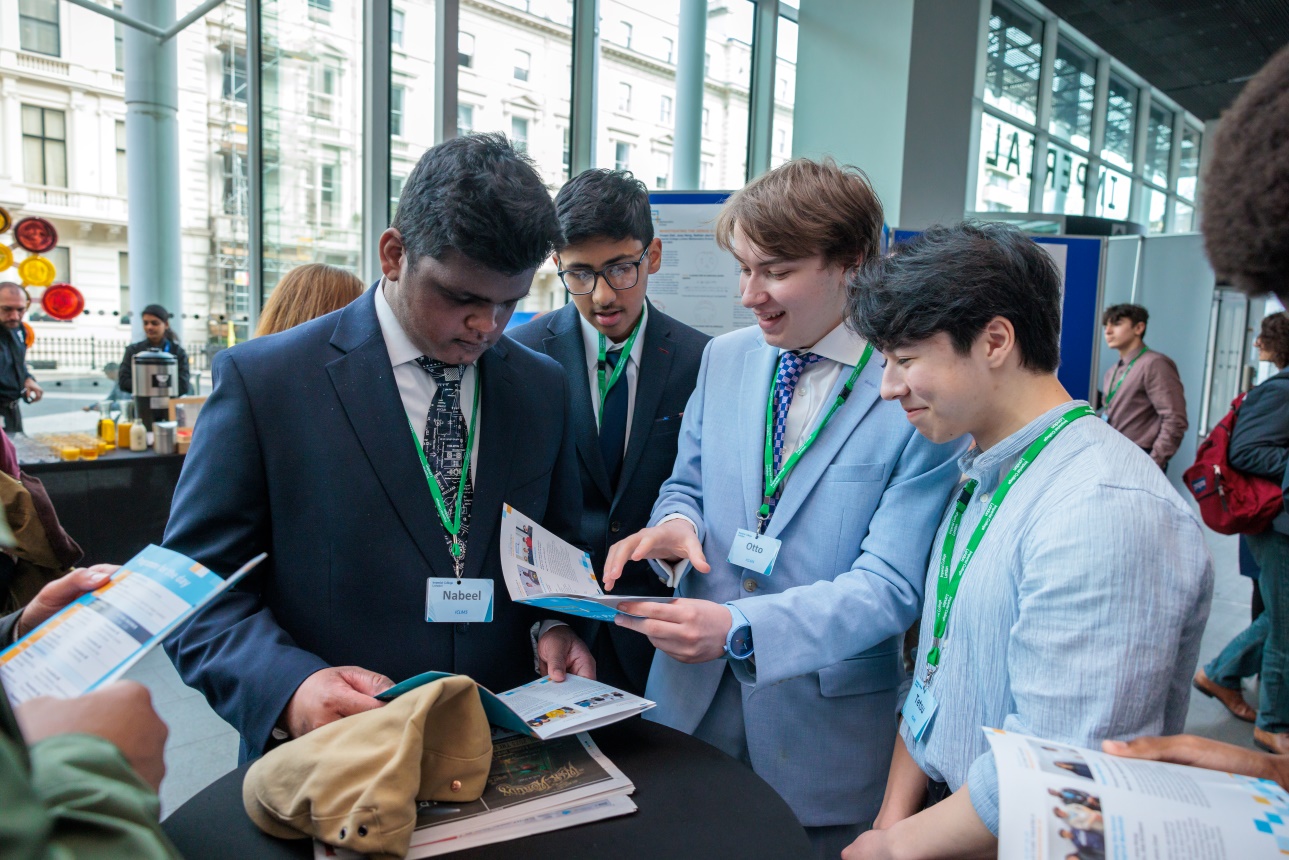 Students looking at the timetables
